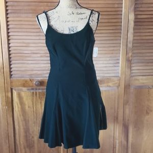Vintage Brandnew beautiful green velvet sleeveless mini dress size 9 by Rampage.